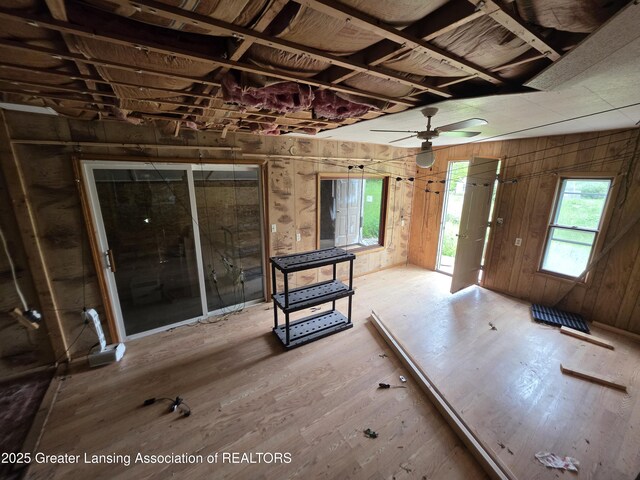 9304-9306 Parkhurst Hwy, Addison, MI 49220 - entryway featuring ceiling fan, wood finished floors, and wood walls
