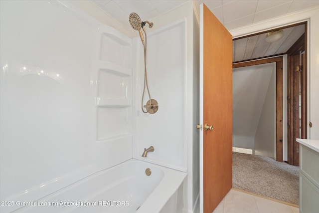 full bath featuring bathing tub / shower combination, tile patterned flooring, and vanity