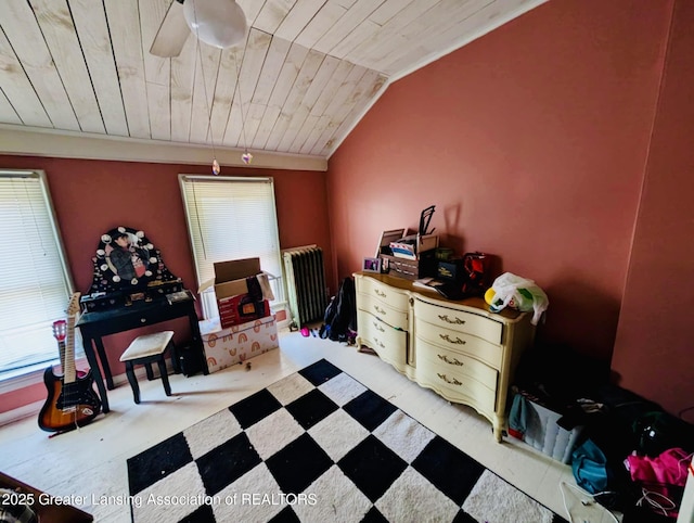 interior space with lofted ceiling, radiator heating unit, and wooden ceiling