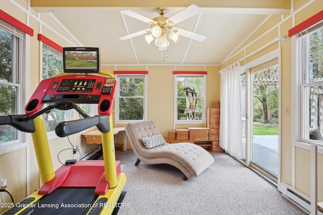 sunroom / solarium with a baseboard heating unit
