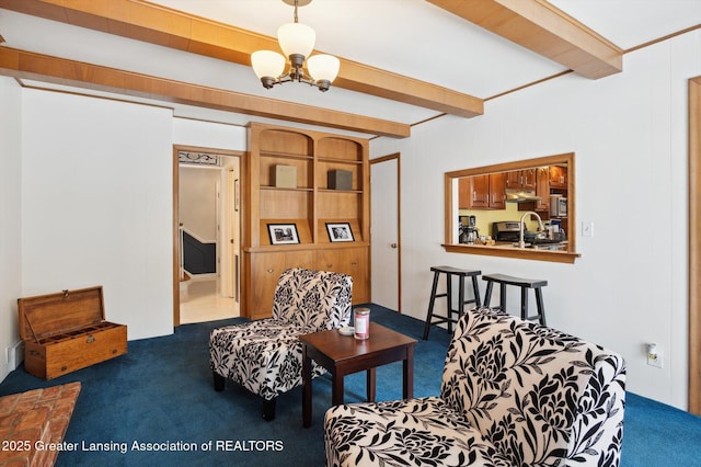 carpeted living room with beam ceiling and a notable chandelier