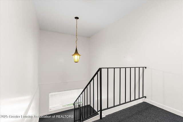 stairs featuring baseboards