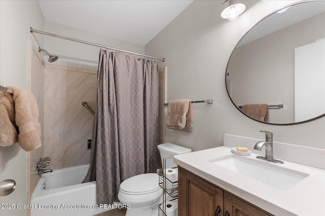 full bath featuring vanity, toilet, and shower / tub combo