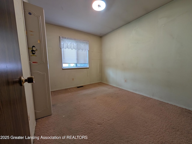 3536 Maybel St, Lansing, MI 48911 - carpeted spare room with baseboards