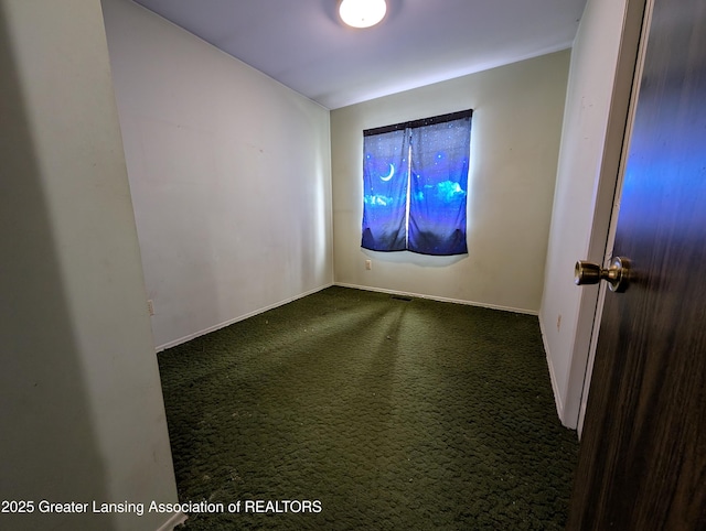 3536 Maybel St, Lansing, MI 48911 - carpeted empty room with baseboards
