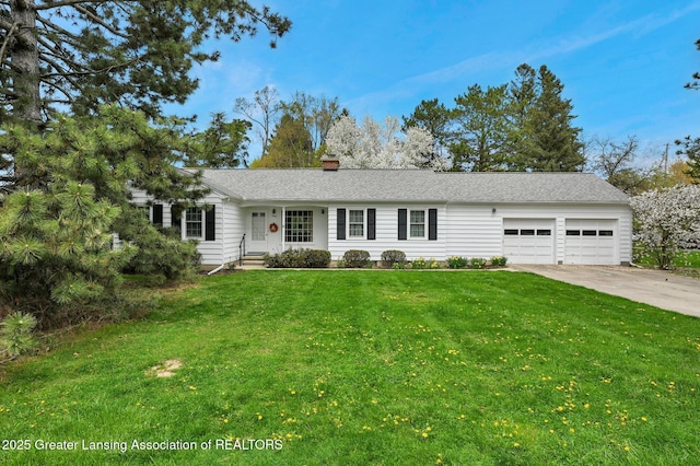 ranch-style home featuring an attached garage, a front yard, driveway, and a chimney