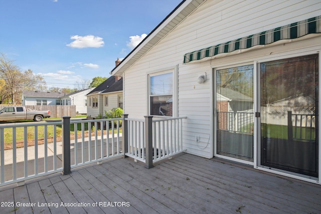 deck with a residential view