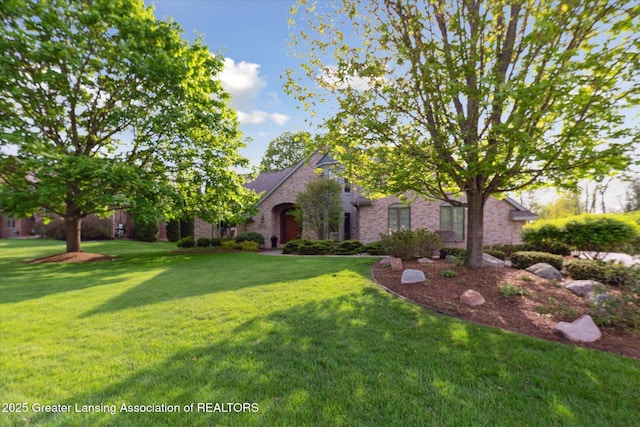 3641 Beech Tree Ln, Okemos, MI 48864 - view of front of house with a front lawn and brick siding