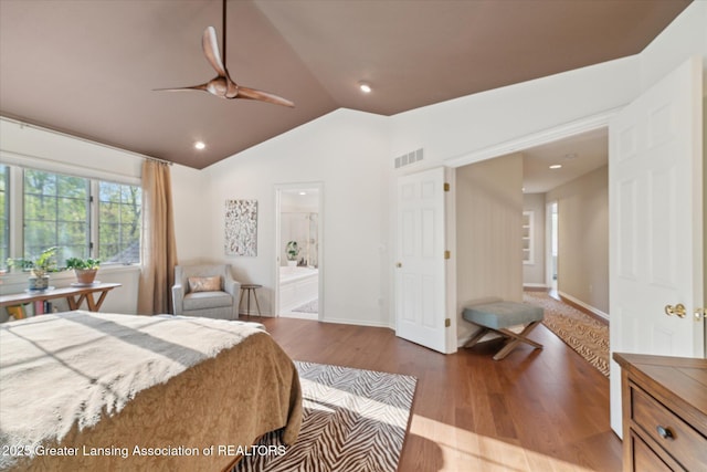 3641 Beech Tree Ln, Okemos, MI 48864 - bedroom with lofted ceiling, wood finished floors, ensuite bathroom, baseboards, and a ceiling fan