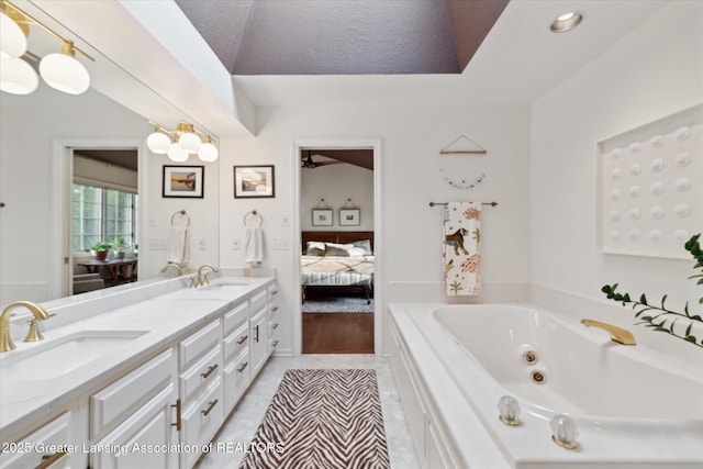 3641 Beech Tree Ln, Okemos, MI 48864 - bathroom featuring a whirlpool tub, ensuite bath, and double vanity