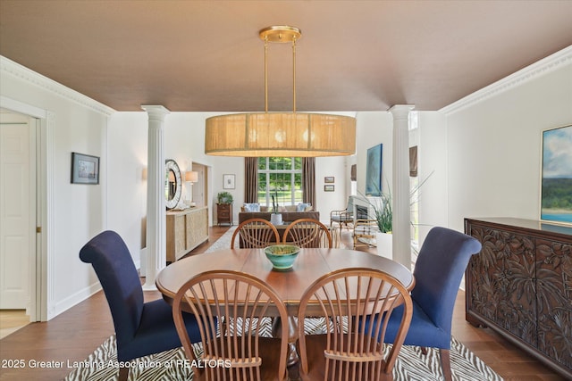 3641 Beech Tree Ln, Okemos, MI 48864 - dining area with decorative columns and wood finished floors