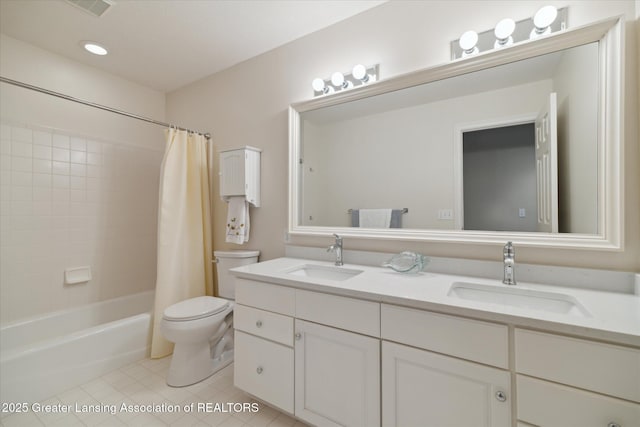 3641 Beech Tree Ln, Okemos, MI 48864 - full bath with double vanity, tile patterned flooring, and shower / bath combo