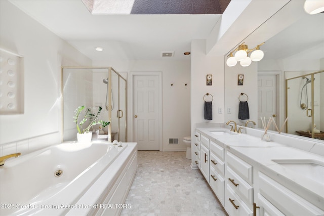 3641 Beech Tree Ln, Okemos, MI 48864 - full bath with a stall shower, a jetted tub, and double vanity