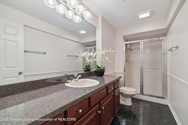 3641 Beech Tree Ln, Okemos, MI 48864 - bathroom with vanity, a shower stall, and tile patterned floors