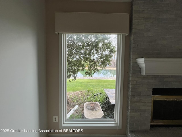 1425 E Lakeside Dr, East Lansing, MI 48823 - doorway featuring a fireplace
