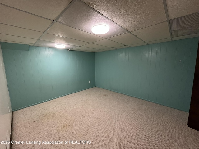 1425 E Lakeside Dr, East Lansing, MI 48823 - finished basement featuring carpet floors, baseboards, and a paneled ceiling