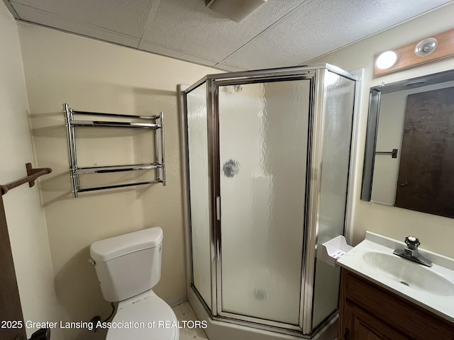 1425 E Lakeside Dr, East Lansing, MI 48823 - bathroom featuring vanity, toilet, and a stall shower