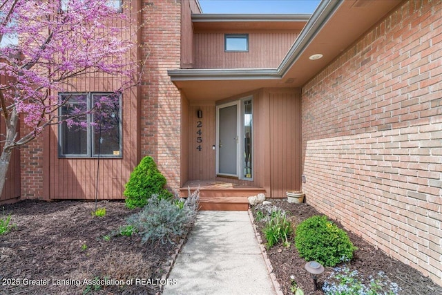 2454 Emerald Lake Dr, East Lansing, MI 48823 - property entrance with brick siding