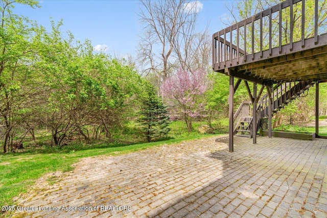 2454 Emerald Lake Dr, East Lansing, MI 48823 - view of patio / terrace featuring a wooden deck and stairs