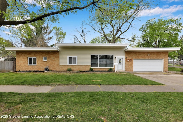 view of front of property featuring concrete driveway, brick siding, an attached garage, and a front lawn