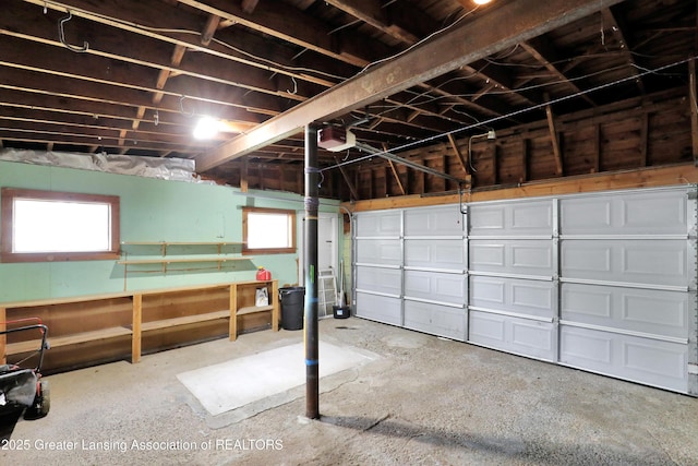 garage featuring a garage door opener
