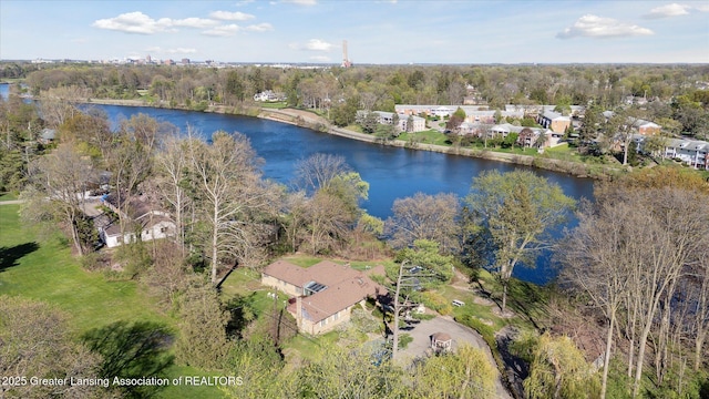 birds eye view of property featuring a water view and a residential view