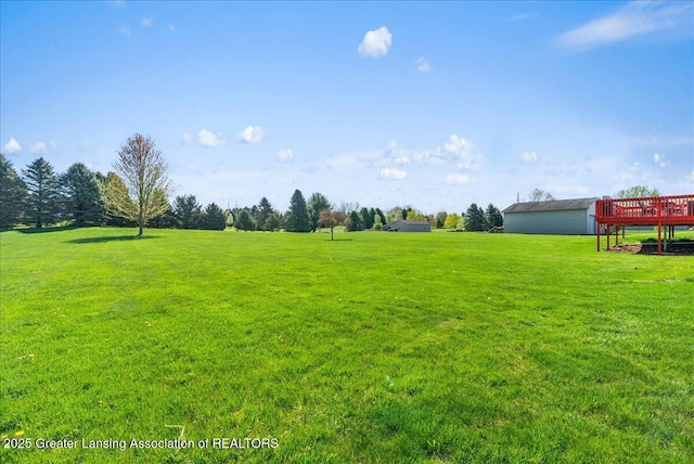 view of yard featuring a deck