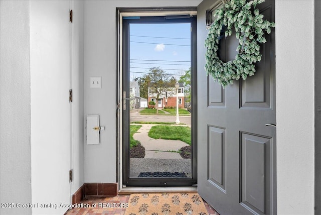foyer entrance with baseboards