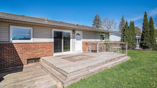 wooden deck with fence and a yard