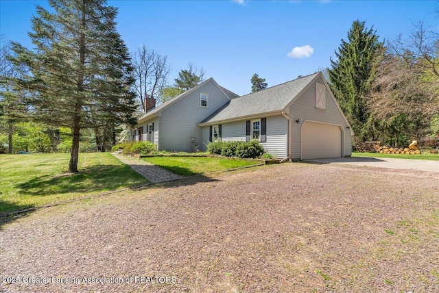 12188 Forest Meadow Dr, Perry, MI 48872 - view of front of property with concrete driveway, a chimney, a front lawn, and a garage