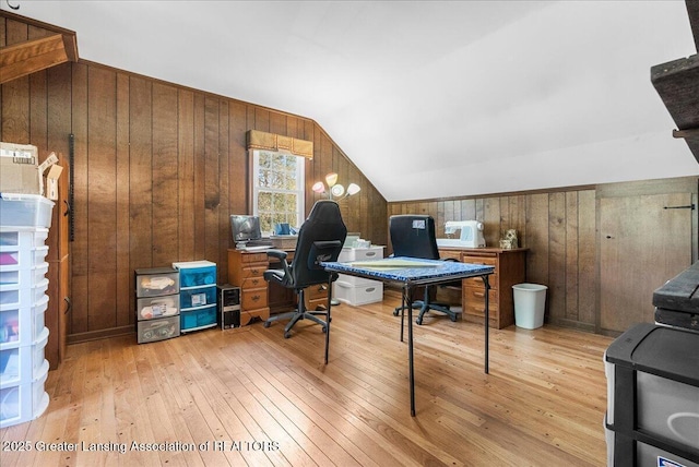 12188 Forest Meadow Dr, Perry, MI 48872 - home office featuring light wood finished floors, wooden walls, and vaulted ceiling