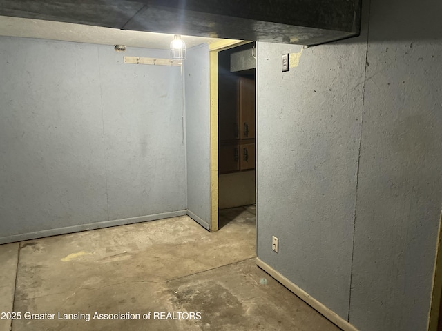 basement featuring baseboards