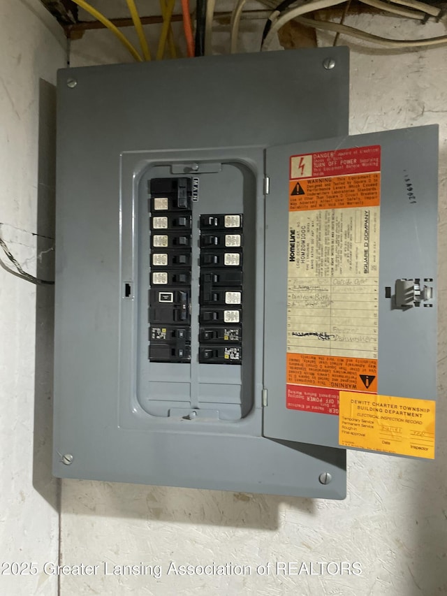 utility room featuring electric panel