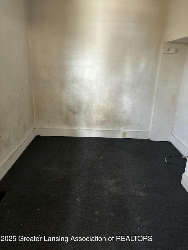 spare room with carpet floors
