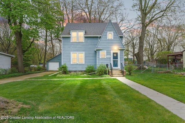view of front of house featuring fence, a shingled roof, a garage, a front yard, and a chimney