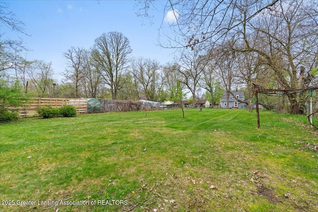 2035 Mary Ave, Lansing, MI 48910 - view of yard with fence