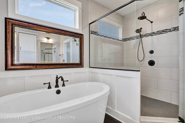 full bath with tiled shower