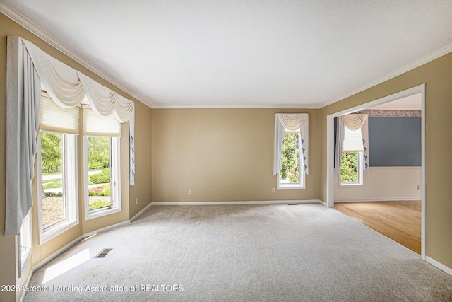 3796 Viceroy Dr, Okemos, MI 48864 - carpeted empty room featuring baseboards and crown molding