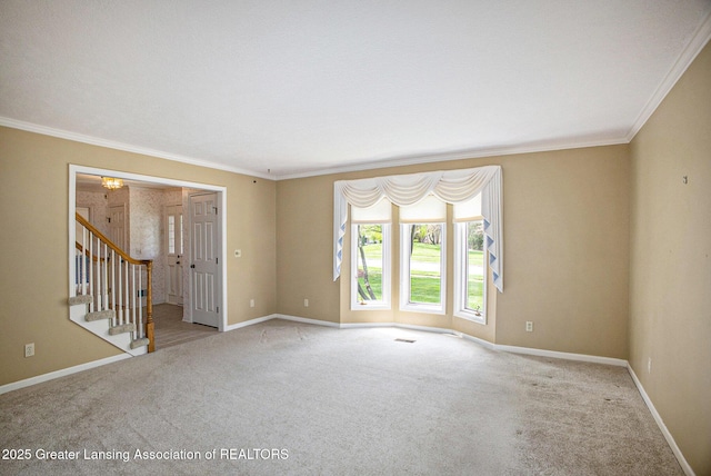 3796 Viceroy Dr, Okemos, MI 48864 - carpeted empty room featuring crown molding, baseboards, and stairs