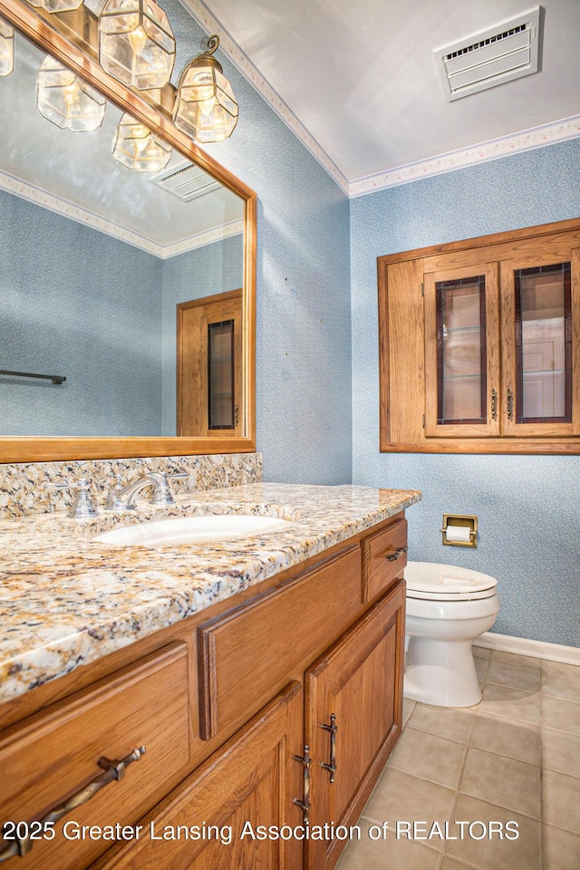 3796 Viceroy Dr, Okemos, MI 48864 - bathroom featuring toilet, vanity, tile patterned floors, wallpapered walls, and baseboards