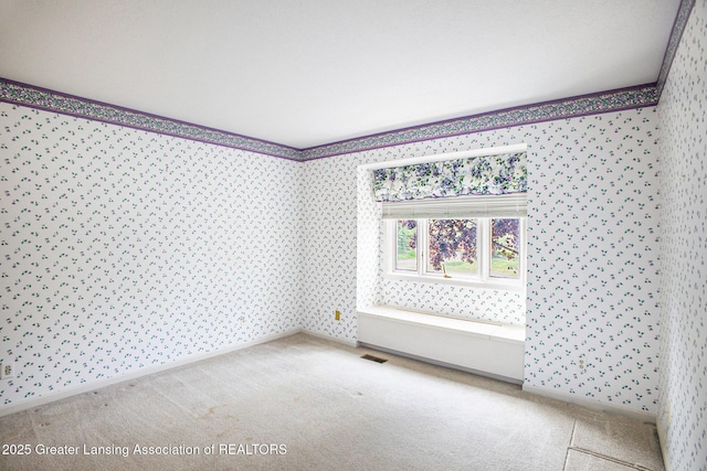 3796 Viceroy Dr, Okemos, MI 48864 - carpeted empty room featuring wallpapered walls, baseboards, and crown molding