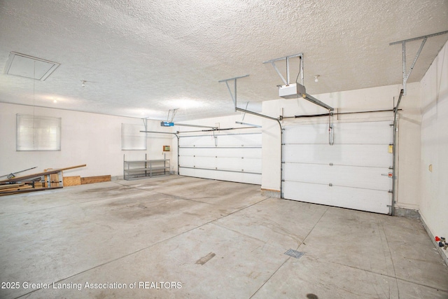 3796 Viceroy Dr, Okemos, MI 48864 - garage with a garage door opener