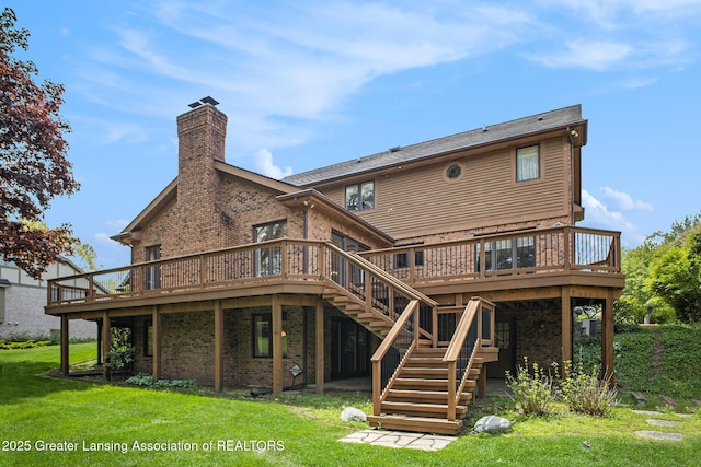 3796 Viceroy Dr, Okemos, MI 48864 - back of house with a chimney, brick siding, a wooden deck, and a yard