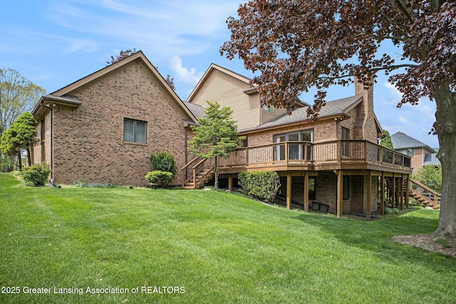 3796 Viceroy Dr, Okemos, MI 48864 - rear view of property featuring stairway, brick siding, and a wooden deck