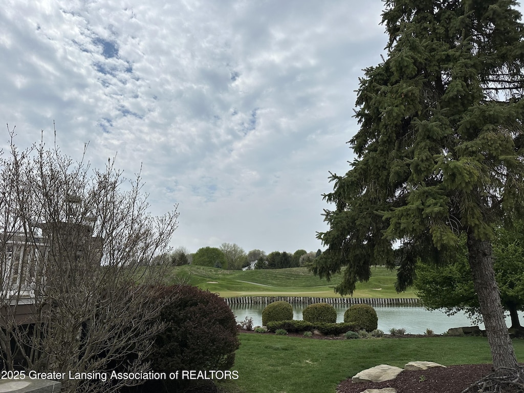property view of water featuring golf course view