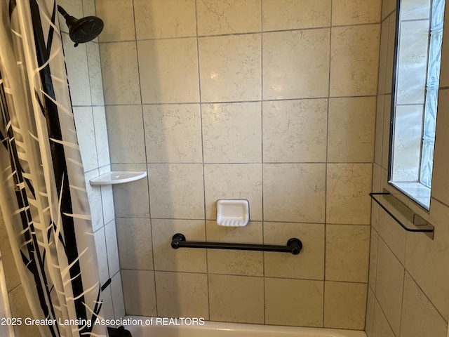 bathroom with curtained shower