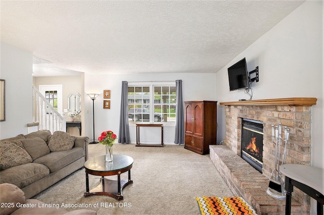 11190 Cobblestone Ln, Grand Ledge, MI 48837 - living room with a brick fireplace, light colored carpet, healthy amount of natural light, a textured ceiling, and stairs