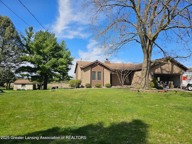 9466 W Grand River Ave, Grand Ledge, MI 48837 - ranch-style house featuring a chimney and a front lawn