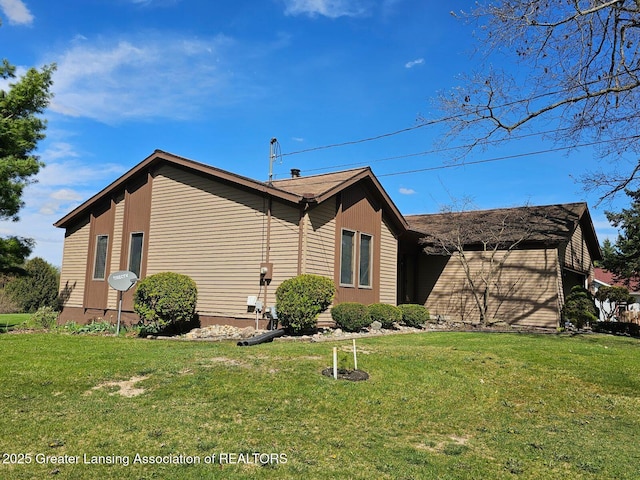 9466 W Grand River Ave, Grand Ledge, MI 48837 - exterior space with a front yard