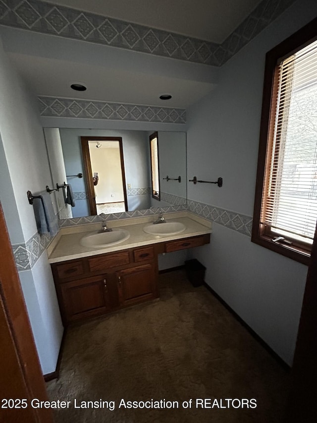 9466 W Grand River Ave, Grand Ledge, MI 48837 - bathroom with double vanity and a sink